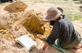 Artist is sculpting the girl face in sand at Wonderland exhibition, Blacktown Showground.